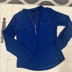 Dark blue blouse with gold accents